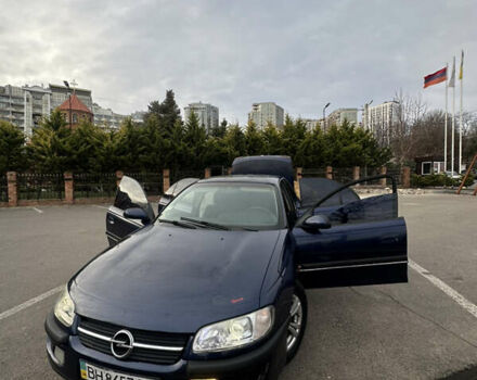 Синий Опель Омега, объемом двигателя 3 л и пробегом 426 тыс. км за 2000 $, фото 1 на Automoto.ua