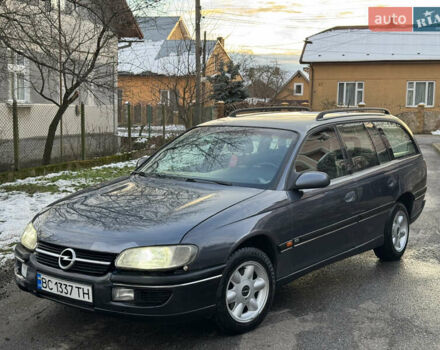 Синий Опель Омега, объемом двигателя 2 л и пробегом 335 тыс. км за 1599 $, фото 1 на Automoto.ua