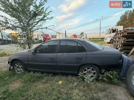 Синий Опель Омега, объемом двигателя 3 л и пробегом 560 тыс. км за 1500 $, фото 1 на Automoto.ua