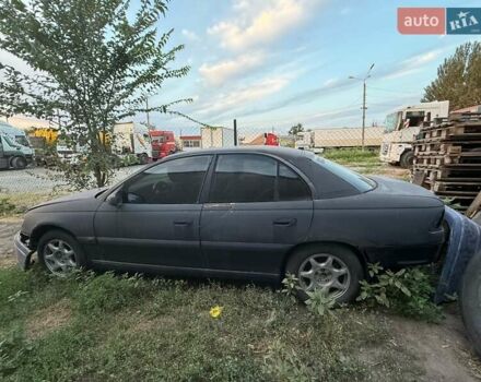 Синий Опель Омега, объемом двигателя 3 л и пробегом 560 тыс. км за 1500 $, фото 1 на Automoto.ua