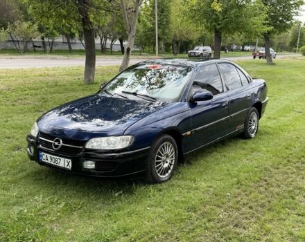 Синий Опель Омега, объемом двигателя 2.5 л и пробегом 200 тыс. км за 1550 $, фото 1 на Automoto.ua