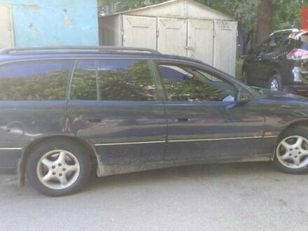 Синий Опель Омега, объемом двигателя 2 л и пробегом 488 тыс. км за 3300 $, фото 1 на Automoto.ua