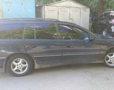 Синий Опель Омега, объемом двигателя 2 л и пробегом 488 тыс. км за 3300 $, фото 1 на Automoto.ua