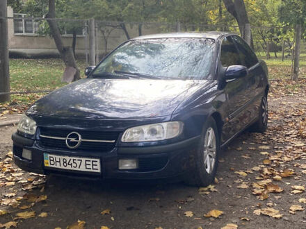 Синий Опель Омега, объемом двигателя 3 л и пробегом 422 тыс. км за 2200 $, фото 1 на Automoto.ua
