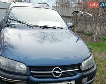 Синий Опель Омега, объемом двигателя 2.5 л и пробегом 300 тыс. км за 2000 $, фото 1 на Automoto.ua