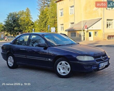 Синий Опель Омега, объемом двигателя 2.5 л и пробегом 357 тыс. км за 1250 $, фото 1 на Automoto.ua