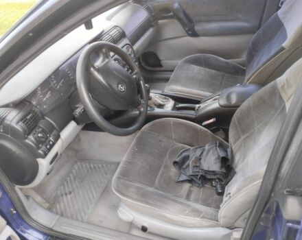 Синій Опель Омега, об'ємом двигуна 2 л та пробігом 306 тис. км за 1950 $, фото 1 на Automoto.ua