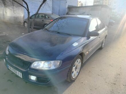 Синий Опель Омега, объемом двигателя 2 л и пробегом 439 тыс. км за 1424 $, фото 1 на Automoto.ua