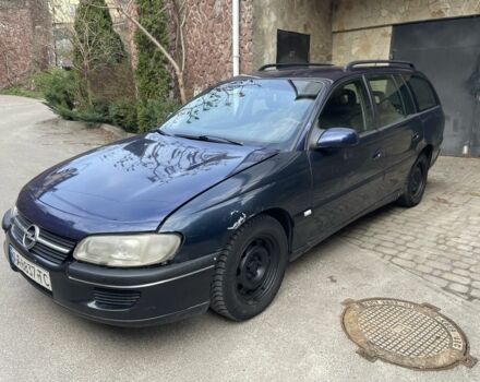 Синий Опель Омега, объемом двигателя 2 л и пробегом 350 тыс. км за 1250 $, фото 1 на Automoto.ua