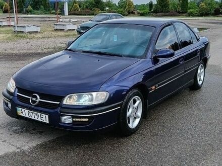 Синий Опель Омега, объемом двигателя 2 л и пробегом 60 тыс. км за 1800 $, фото 1 на Automoto.ua