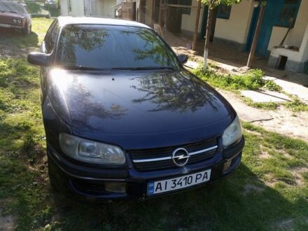 Синий Опель Омега, объемом двигателя 2 л и пробегом 200 тыс. км за 1200 $, фото 1 на Automoto.ua