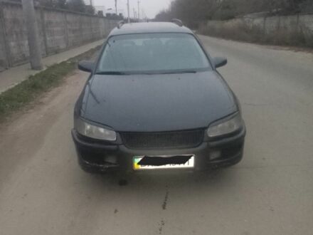 Синий Опель Омега, объемом двигателя 2.5 л и пробегом 200 тыс. км за 900 $, фото 1 на Automoto.ua