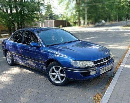 Синий Опель Омега, объемом двигателя 2.5 л и пробегом 289 тыс. км за 1600 $, фото 1 на Automoto.ua