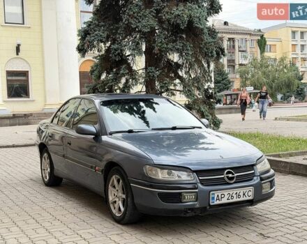 Синий Опель Омега, объемом двигателя 2 л и пробегом 300 тыс. км за 1750 $, фото 1 на Automoto.ua