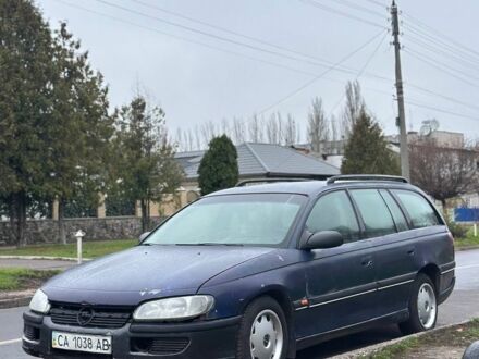 Синий Опель Омега, объемом двигателя 0 л и пробегом 320 тыс. км за 1350 $, фото 1 на Automoto.ua