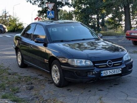 Синий Опель Омега, объемом двигателя 2 л и пробегом 260 тыс. км за 1800 $, фото 1 на Automoto.ua