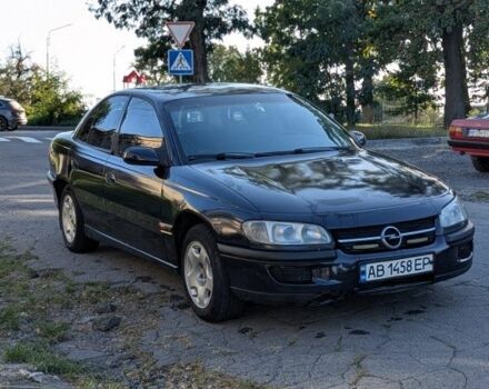Синий Опель Омега, объемом двигателя 2 л и пробегом 260 тыс. км за 1800 $, фото 1 на Automoto.ua