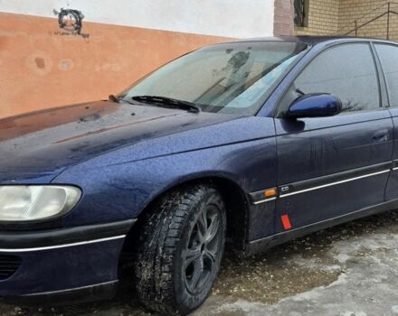 Синий Опель Омега, объемом двигателя 2 л и пробегом 380 тыс. км за 1350 $, фото 1 на Automoto.ua