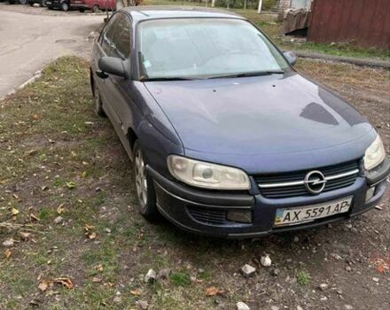Синий Опель Омега, объемом двигателя 2 л и пробегом 280 тыс. км за 800 $, фото 1 на Automoto.ua