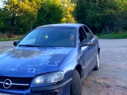 Синий Опель Омега, объемом двигателя 2 л и пробегом 0 тыс. км за 800 $, фото 1 на Automoto.ua