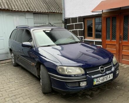 Синий Опель Омега, объемом двигателя 2.5 л и пробегом 205 тыс. км за 1650 $, фото 1 на Automoto.ua