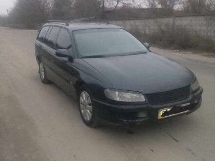 Синій Опель Омега, об'ємом двигуна 2.5 л та пробігом 200 тис. км за 450 $, фото 1 на Automoto.ua