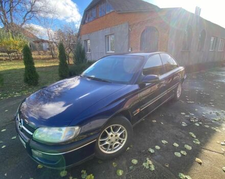 Синий Опель Омега, объемом двигателя 2 л и пробегом 400 тыс. км за 1700 $, фото 1 на Automoto.ua