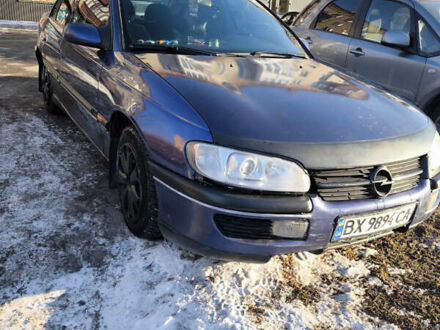 Синий Опель Омега, объемом двигателя 2 л и пробегом 215 тыс. км за 2099 $, фото 1 на Automoto.ua