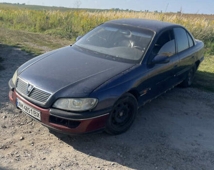 Синий Опель Омега, объемом двигателя 2.5 л и пробегом 327 тыс. км за 1200 $, фото 1 на Automoto.ua
