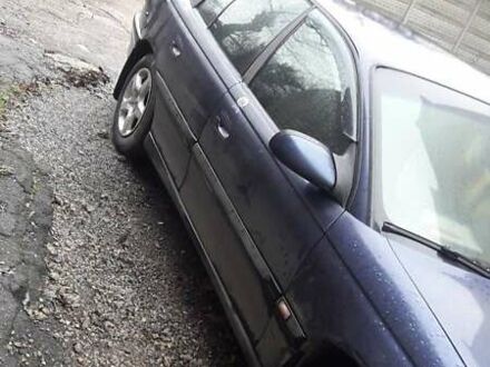 Синій Опель Омега, об'ємом двигуна 2.5 л та пробігом 250 тис. км за 2300 $, фото 1 на Automoto.ua