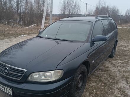Синий Опель Омега, объемом двигателя 2 л и пробегом 350 тыс. км за 1400 $, фото 1 на Automoto.ua