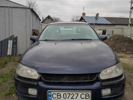 Синий Опель Омега, объемом двигателя 2.5 л и пробегом 400 тыс. км за 2400 $, фото 1 на Automoto.ua