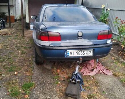 Синий Опель Омега, объемом двигателя 2.5 л и пробегом 300 тыс. км за 900 $, фото 1 на Automoto.ua