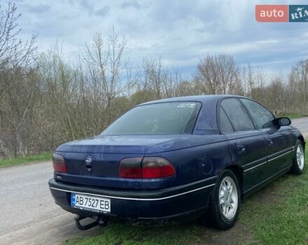 Синий Опель Омега, объемом двигателя 2 л и пробегом 290 тыс. км за 1500 $, фото 1 на Automoto.ua