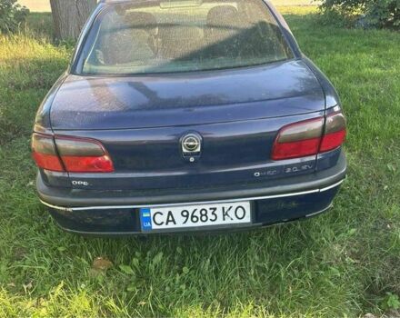Синий Опель Омега, объемом двигателя 2 л и пробегом 250 тыс. км за 903 $, фото 1 на Automoto.ua