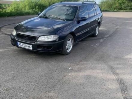 Синий Опель Омега, объемом двигателя 2.5 л и пробегом 312 тыс. км за 1750 $, фото 1 на Automoto.ua