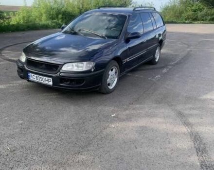 Синий Опель Омега, объемом двигателя 2.5 л и пробегом 312 тыс. км за 1750 $, фото 1 на Automoto.ua
