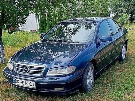 Синий Опель Омега, объемом двигателя 2.2 л и пробегом 315 тыс. км за 3000 $, фото 1 на Automoto.ua