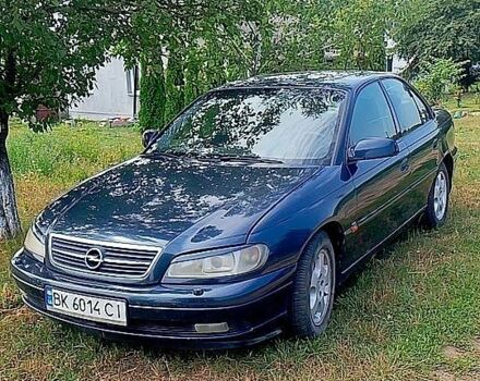 Синий Опель Омега, объемом двигателя 2.2 л и пробегом 315 тыс. км за 3000 $, фото 1 на Automoto.ua