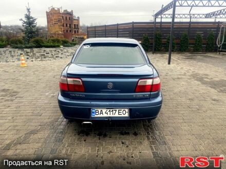 Синий Опель Омега, объемом двигателя 3 л и пробегом 168 тыс. км за 1900 $, фото 1 на Automoto.ua