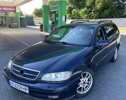 Синій Опель Омега, об'ємом двигуна 2 л та пробігом 250 тис. км за 1996 $, фото 1 на Automoto.ua