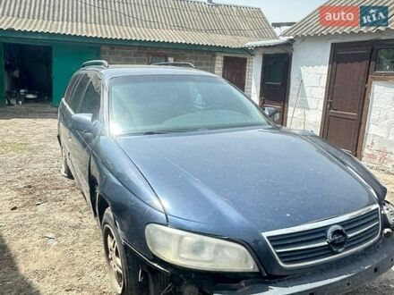 Синий Опель Омега, объемом двигателя 2.5 л и пробегом 350 тыс. км за 1100 $, фото 1 на Automoto.ua
