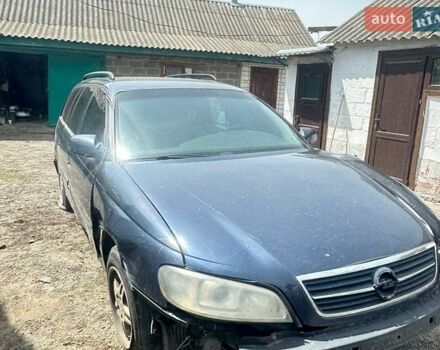 Синий Опель Омега, объемом двигателя 2.5 л и пробегом 350 тыс. км за 1100 $, фото 1 на Automoto.ua