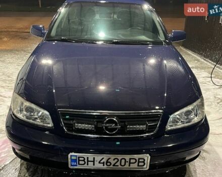 Синий Опель Омега, объемом двигателя 2.2 л и пробегом 368 тыс. км за 3000 $, фото 1 на Automoto.ua