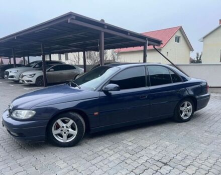 Синий Опель Омега, объемом двигателя 2.2 л и пробегом 367 тыс. км за 2818 $, фото 1 на Automoto.ua