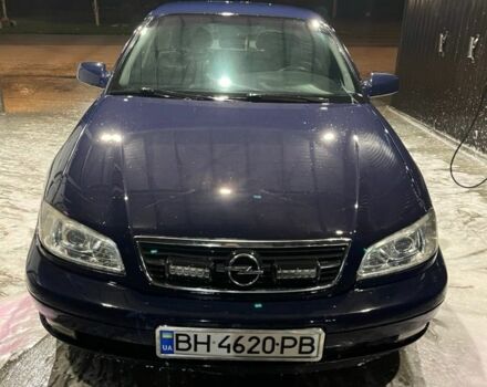 Синий Опель Омега, объемом двигателя 2.2 л и пробегом 368 тыс. км за 2500 $, фото 1 на Automoto.ua