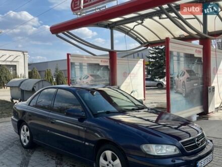 Синий Опель Омега, объемом двигателя 2.6 л и пробегом 355 тыс. км за 2699 $, фото 1 на Automoto.ua