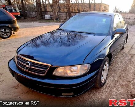 Синий Опель Омега, объемом двигателя 2.2 л и пробегом 300 тыс. км за 2999 $, фото 1 на Automoto.ua
