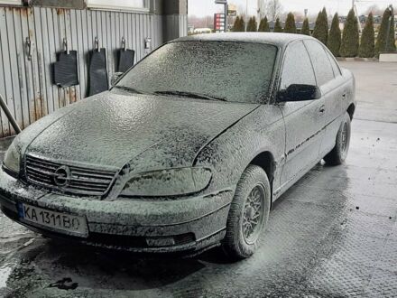 Синий Опель Омега, объемом двигателя 2.2 л и пробегом 333 тыс. км за 3299 $, фото 1 на Automoto.ua
