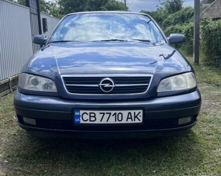 Синий Опель Омега, объемом двигателя 2.2 л и пробегом 260 тыс. км за 2800 $, фото 1 на Automoto.ua
